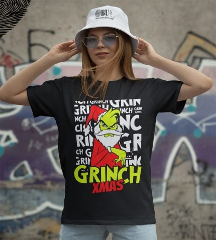 Burshirt'ten Noel temalı Grinch baskılı tişört, genç moda ve cosplay için ideal; rahat kesim, dikkat çekici tasarım, yılbaşı kutlamaları için mükemmel seçenek.